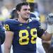 Michigan senior defensive end Craig Roh waves to someone in the stands as the clock winds down on his last home game at Michigan Stadium. Melanie Maxwell I AnnArbor.com
